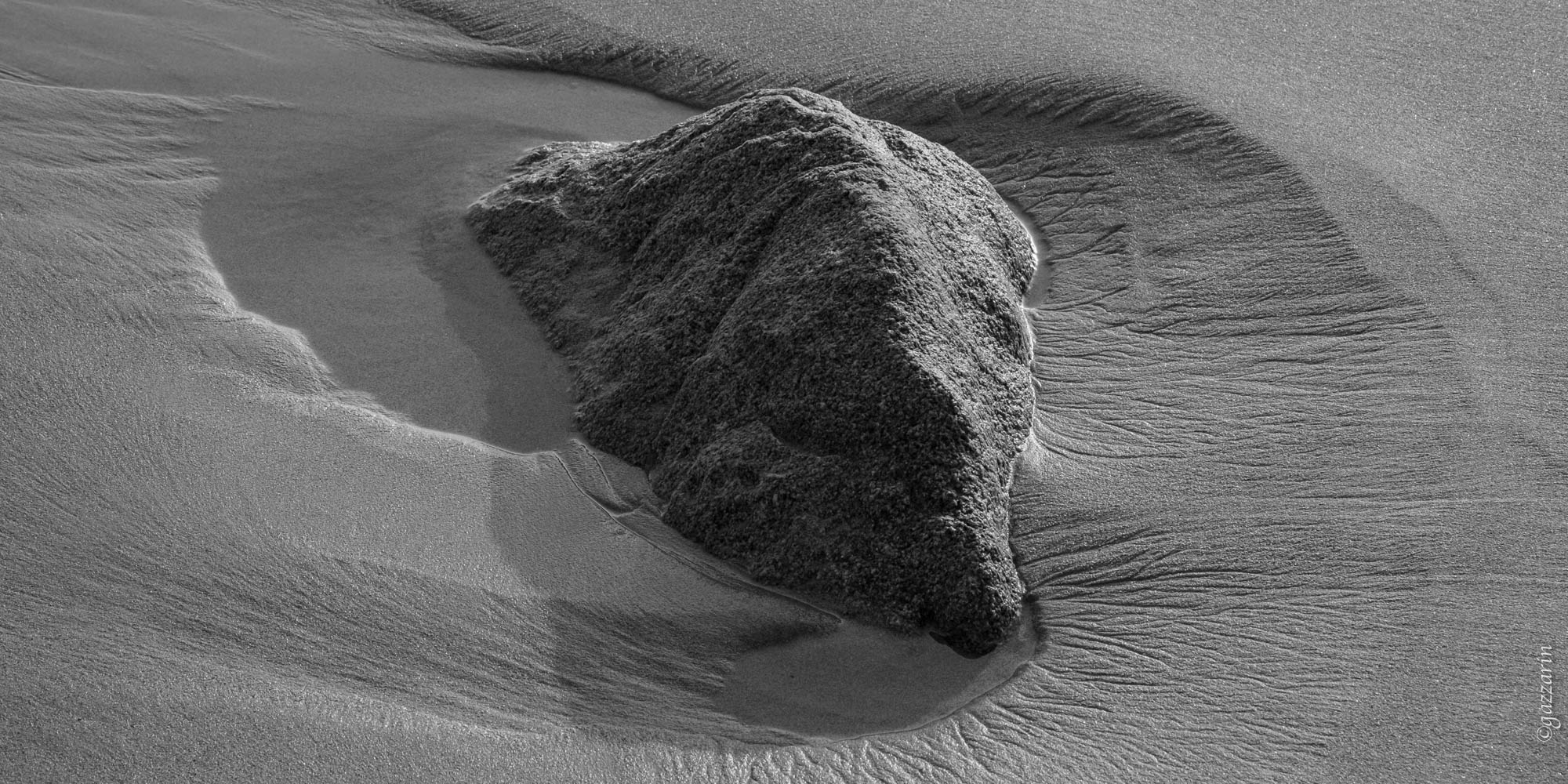 Stein im Sand (Sardinien)